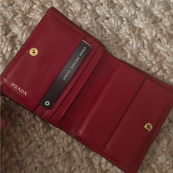 Real prada wallet black leather with red interior
Great condition - Picture 1 of 3